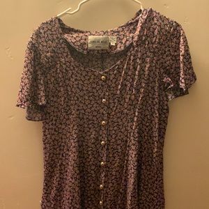 Vintage dress! Floral design with cap sleeves and 10 gold buttons in the front.